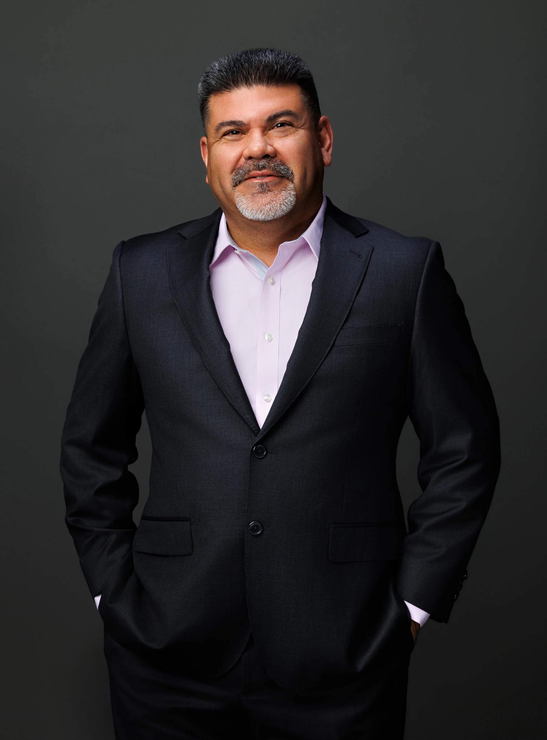 Senior Alarm Pros representative in professional business portrait